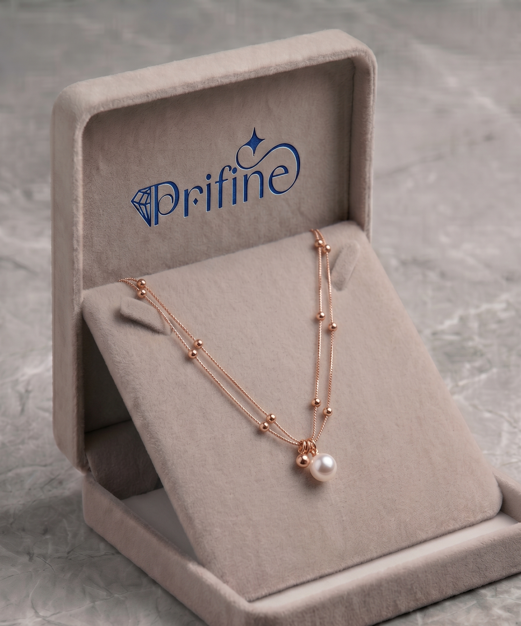 Rose gold double-strand pearl and bead necklace by Prifine featuring elegant, shimmering pearls and beads on a delicate chain.