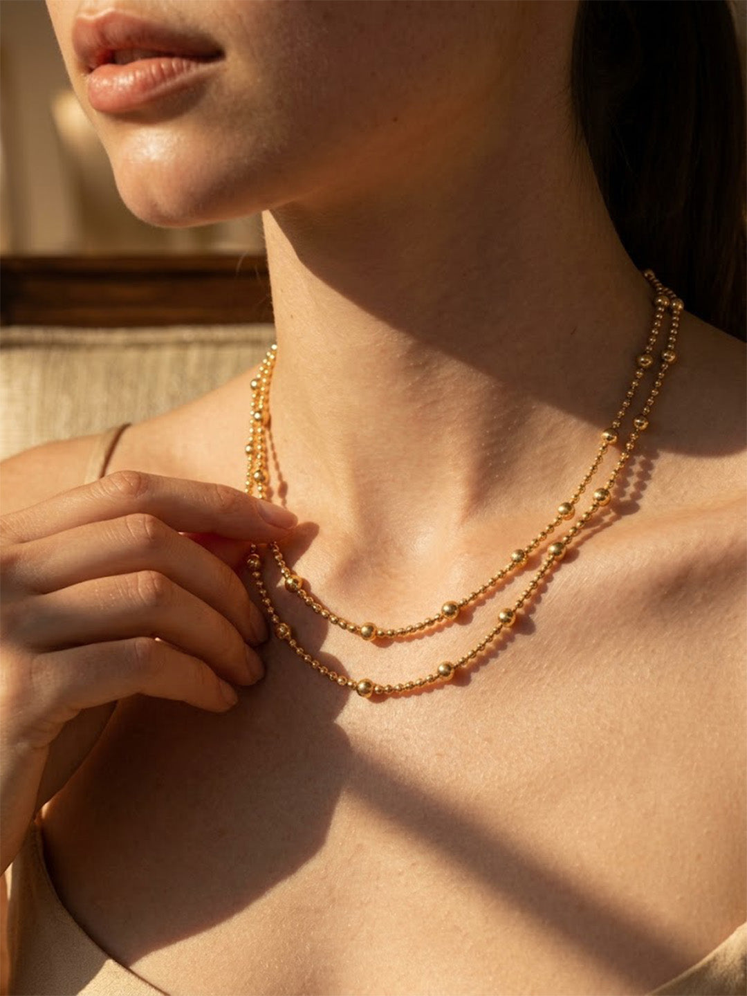 Prifine minimalist double layer gold beaded necklace for women, featuring dainty layered chains and adjustable design.