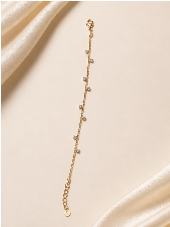 Prifine 18k gold-plated celestial station bracelet with star and moon charms on a delicate chain.