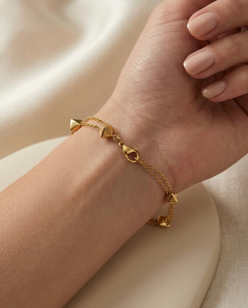 Prifine 18k gold-plated geo stud station bracelet with geometric design, featuring multiple gold-tone stud accents on a delicate chain.