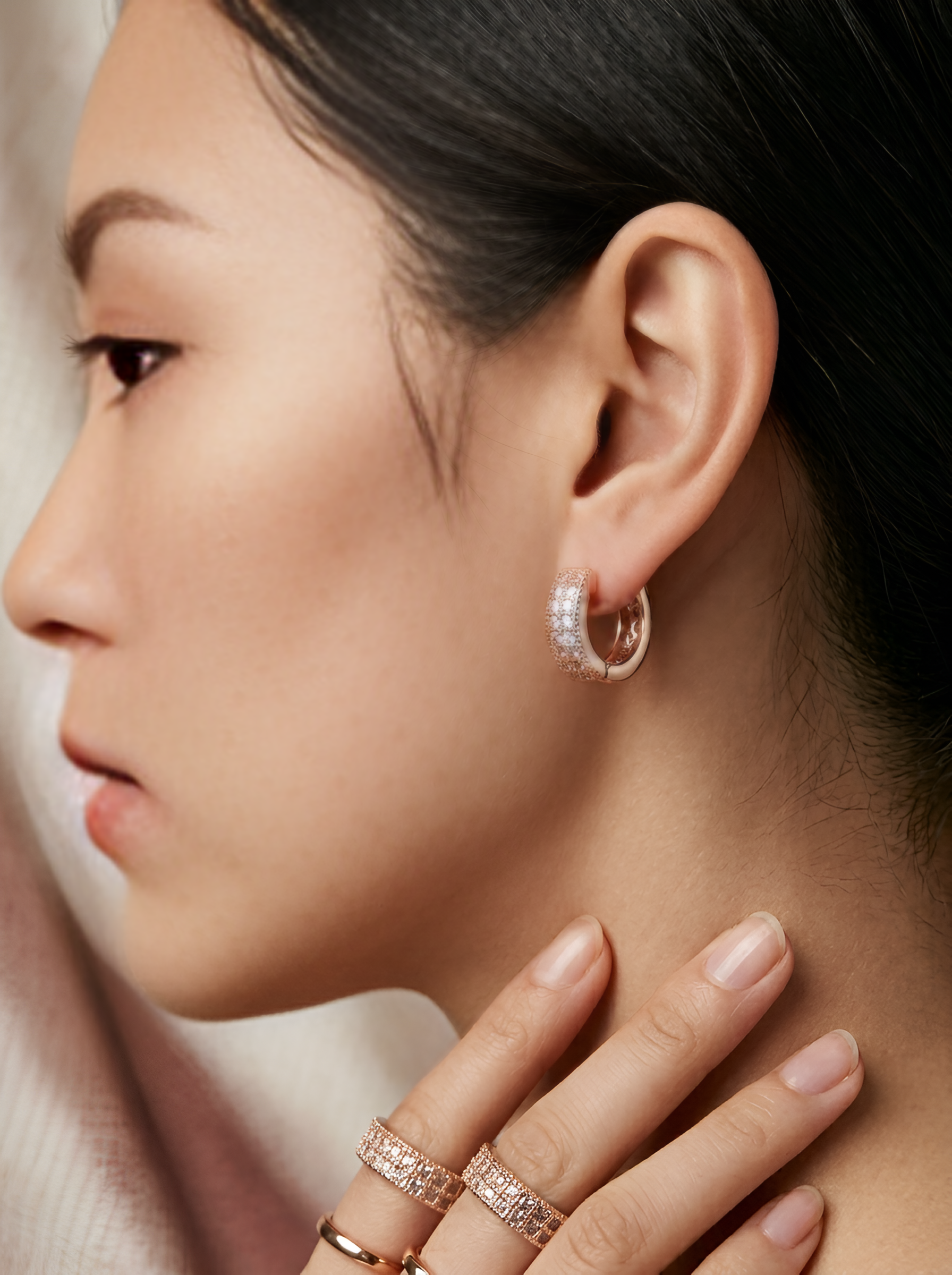 Prifine Aura princess-cut double row rose gold huggie earrings with sparkling gemstones, close-up view of stylish jewelry.