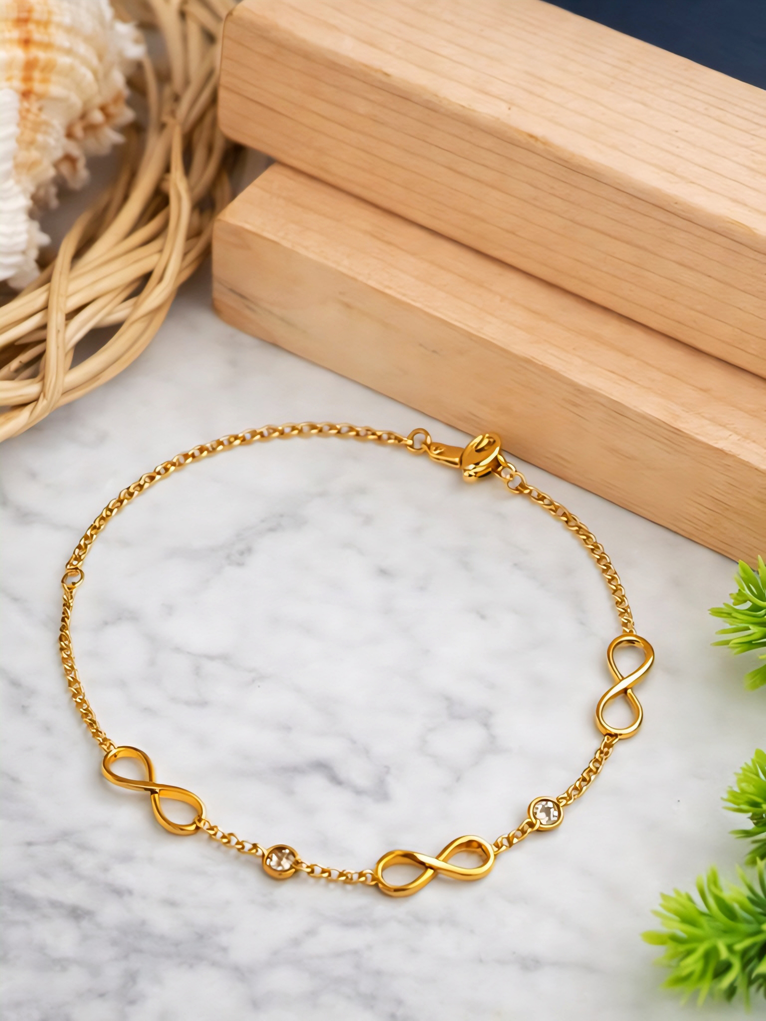Prifine Infinity Multiwear Gold Bracelet featuring a sleek, adjustable design with a polished gold finish.