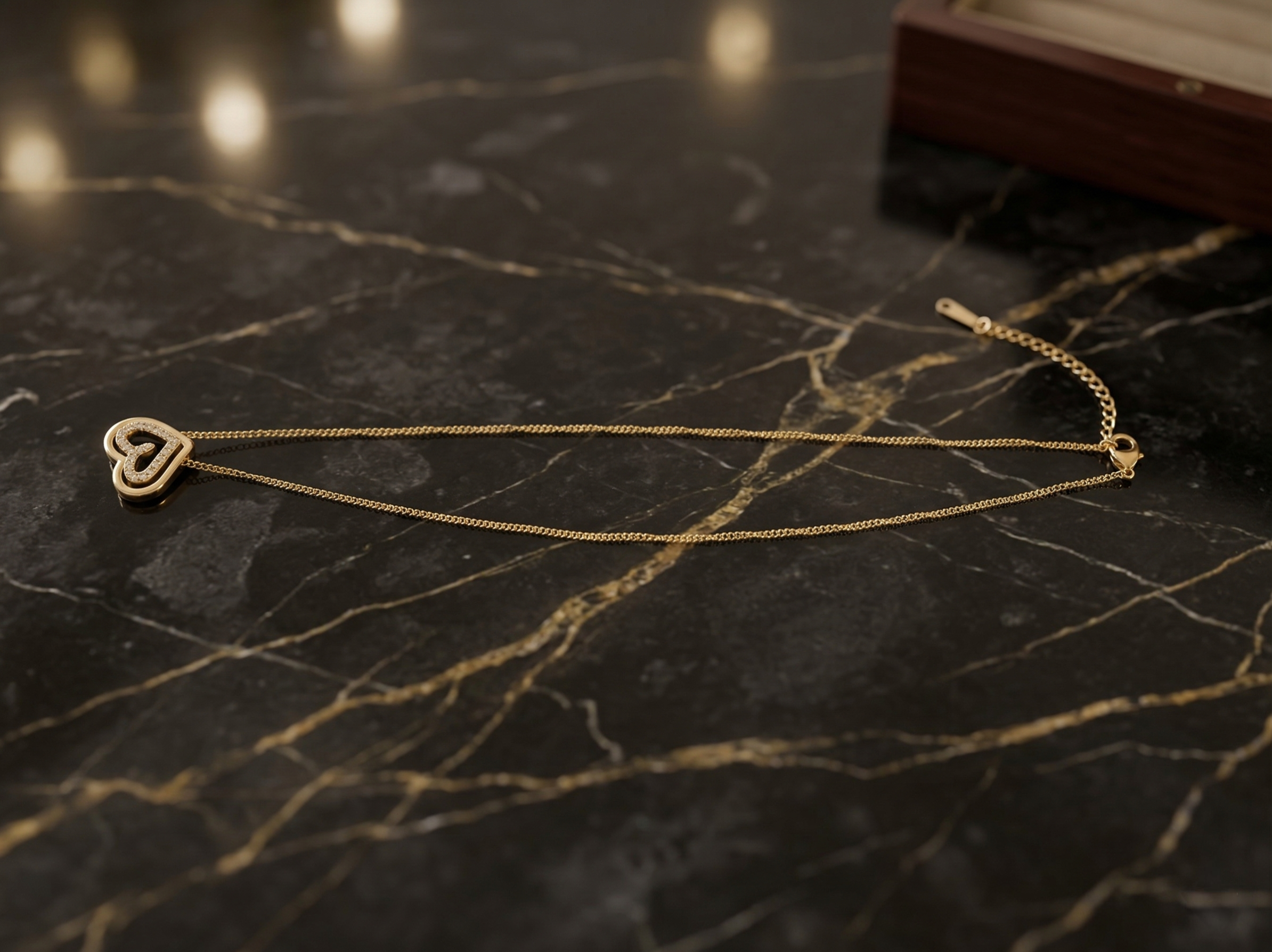 Prifine Golden Heart Duo Pendant Necklace featuring two intertwined heart charms on a delicate chain.