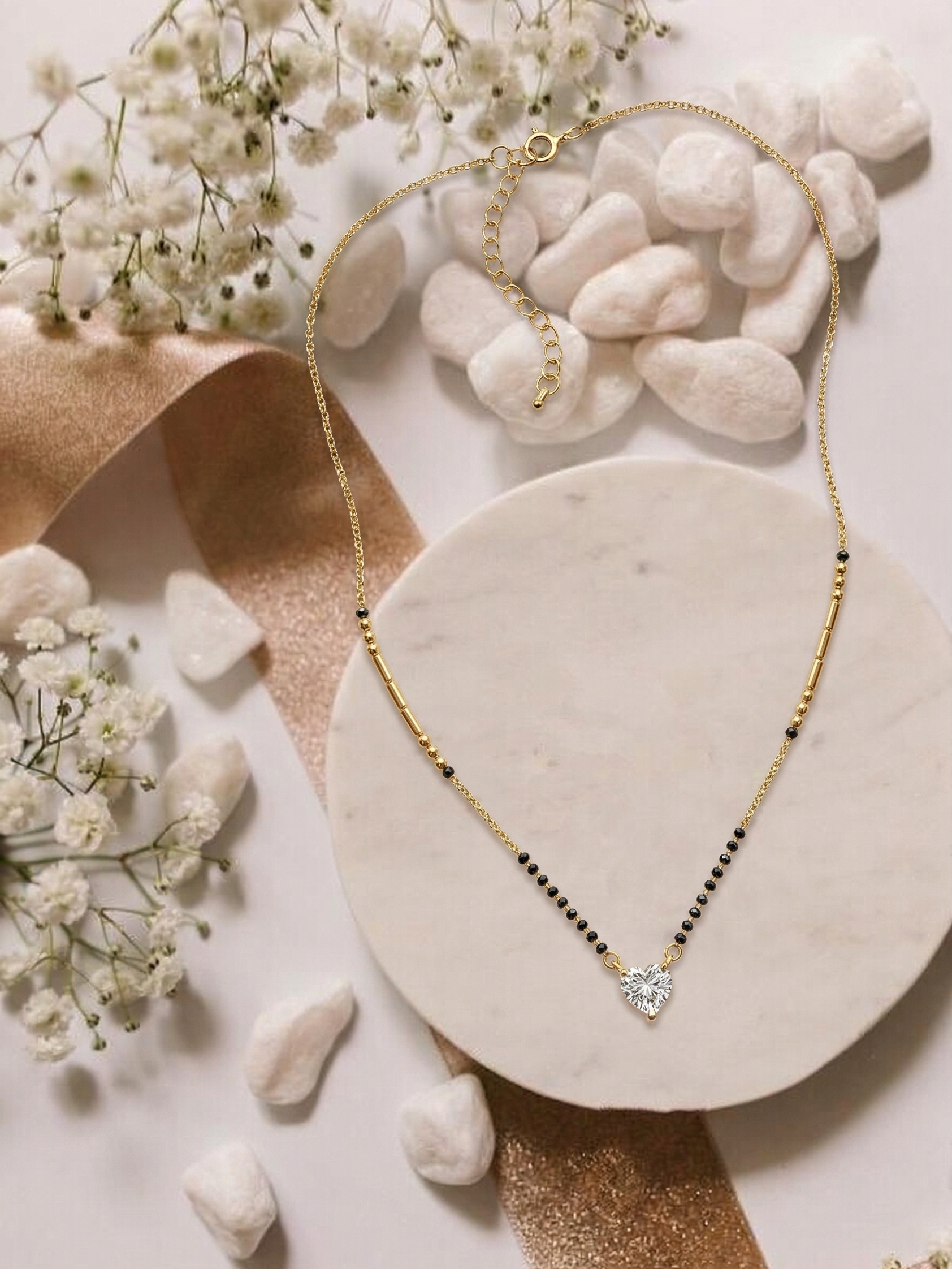 Shine Heart Mangalsutra by Prifine featuring a gold chain with a heart-shaped pendant, elegant and traditional jewelry piece