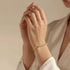 Prifine luxury minimal gold bracelet for women, featuring a sleek and elegant design with a smooth gold finish.