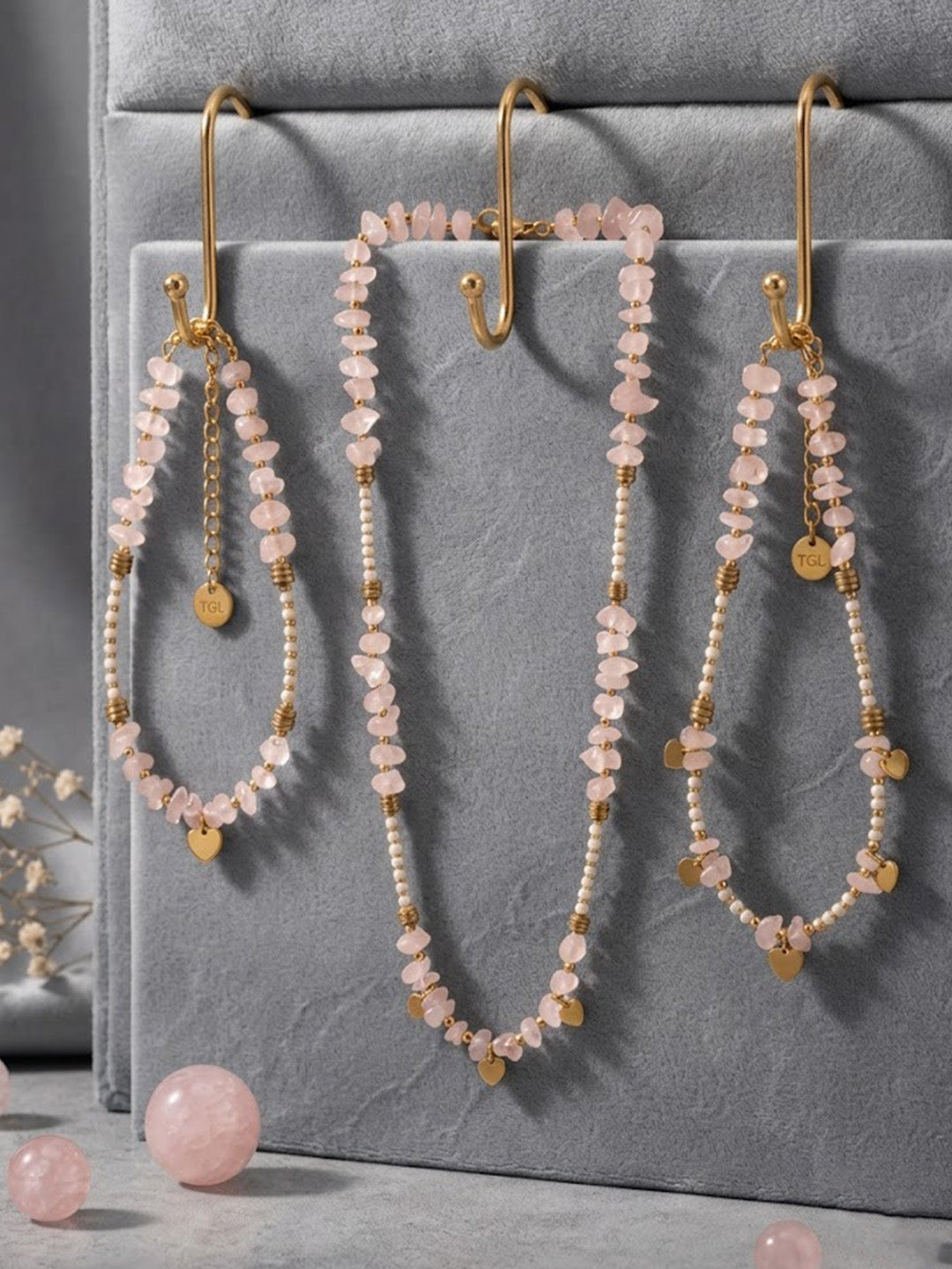 Prifine rose quartz heart charm jewelry set with gold-plated necklace, bracelet, and earrings featuring natural stone and waterproof design.