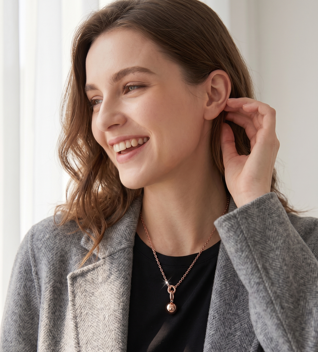Rose gold knot and sphere pendant necklace by Prifine, featuring a elegant design with a polished finish and delicate chain.
