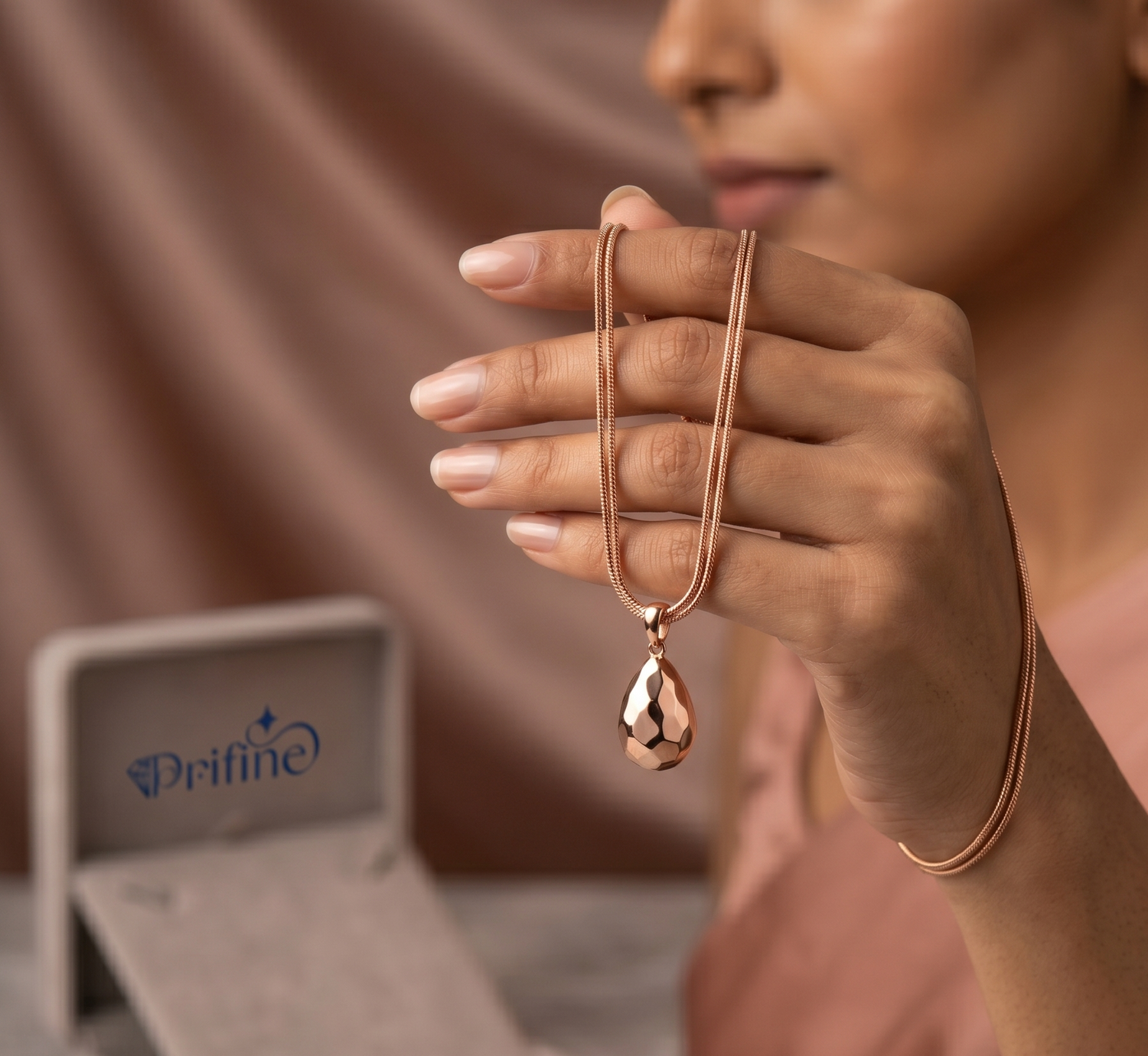 Prifine rose gold hammered teardrop pendant necklace with textured surface, showcasing elegant jewelry design.