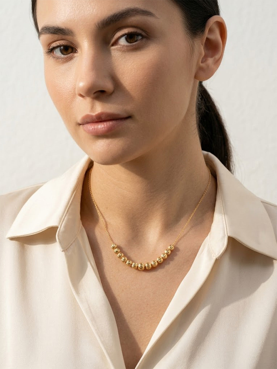 Gold beaded minimalist necklace for women by Prifine, featuring a dainty, elegant chain perfect for everyday layering.