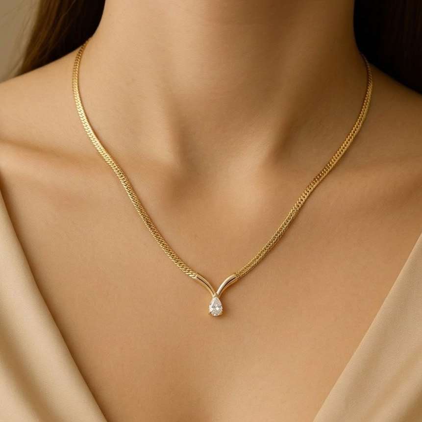 Prifine 18k gold plated teardrop pendant herringbone necklace featuring a sleek, shiny chain and elegant teardrop charm.