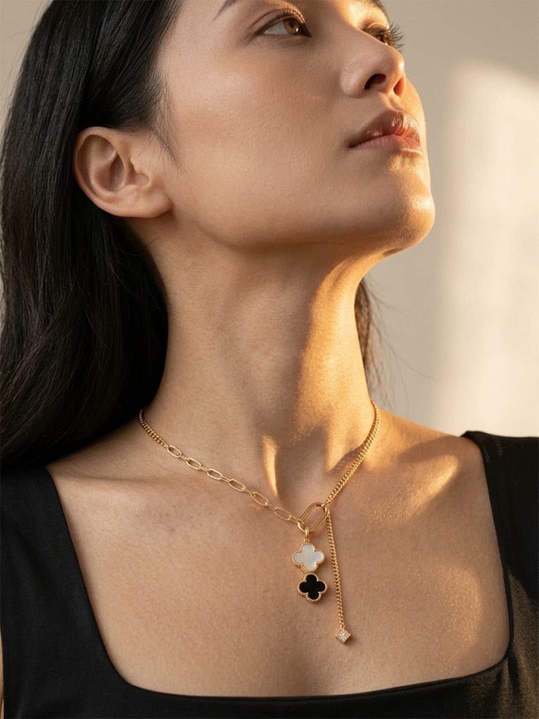 Prifine gold necklace featuring a black and white clover charm pendant, anti-tarnish and premium gold-plated for women.