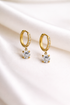 Prifine solitaire hoop drop earring featuring a sparkling central gemstone and elegant gold hoop design.