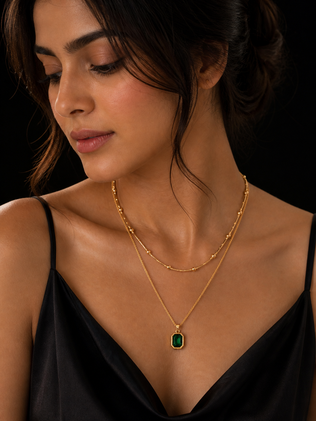 Prifine 18k gold-plated stainless steel emerald layering necklace with multiple delicate chains and vibrant green gemstones.