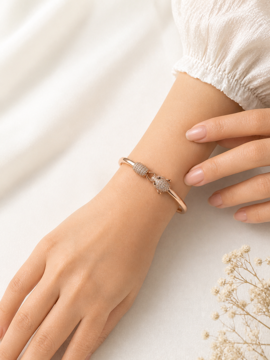 Prifine Wild Elegance Interlocking Panther Bangle featuring sleek silver design and intricate panther motif on shiny metal surface