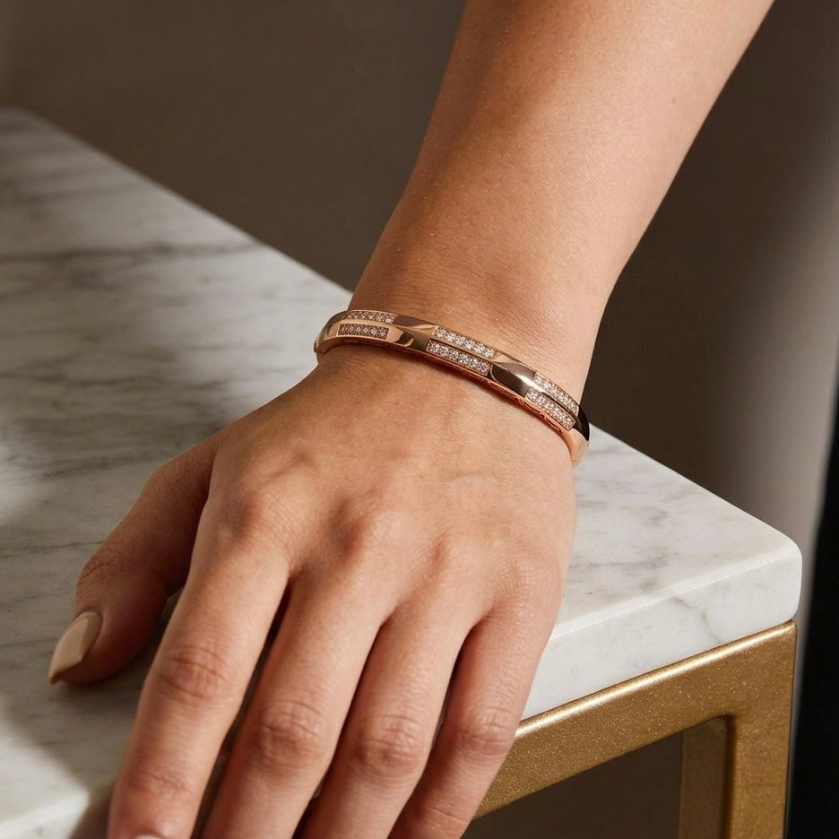 Prifine shimmering horizon bracelet in 18K gold plating, featuring a sleek, elegant design with a shiny, reflective finish.