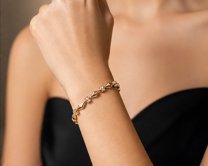 Prifine 18k gold-plated diamond-shaped station bracelet with elegant design and chain links, showcasing a luxurious jewelry piece.