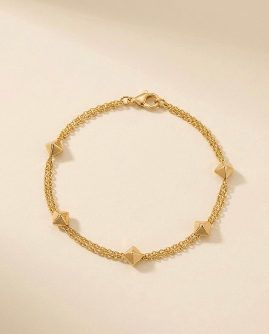 Prifine 18k gold-plated geo stud station bracelet featuring geometric design and small stud accents on a delicate chain.