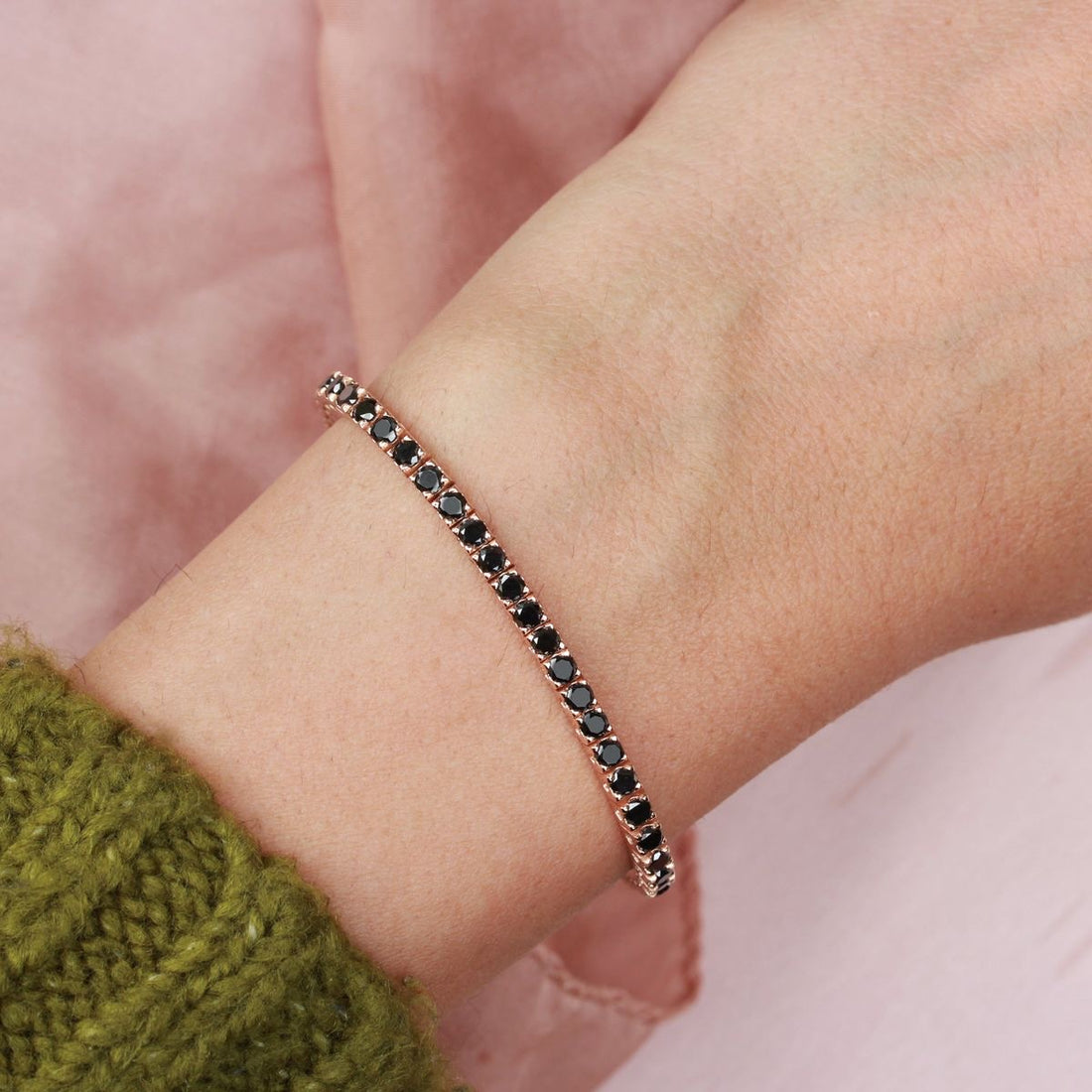 18k gold-plated black spinel tennis bracelet by Prifine featuring sparkling black spinel stones on a delicate gold chain.