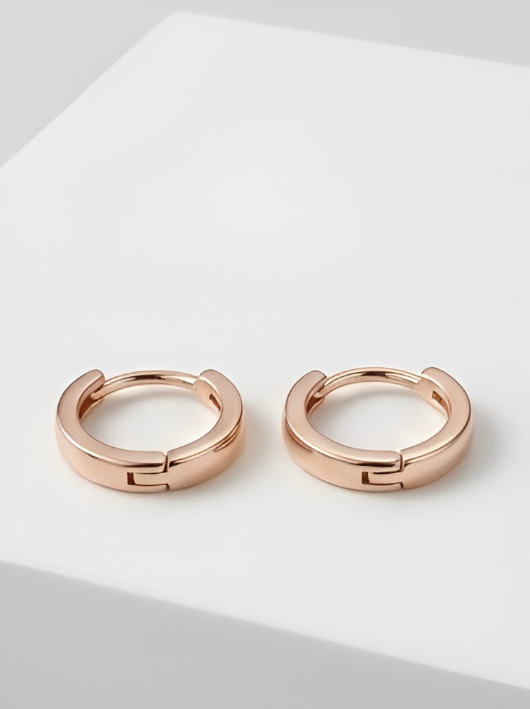 Prifine classic rose gold hoop earrings with a smooth, polished finish, showcasing a timeless jewelry design.