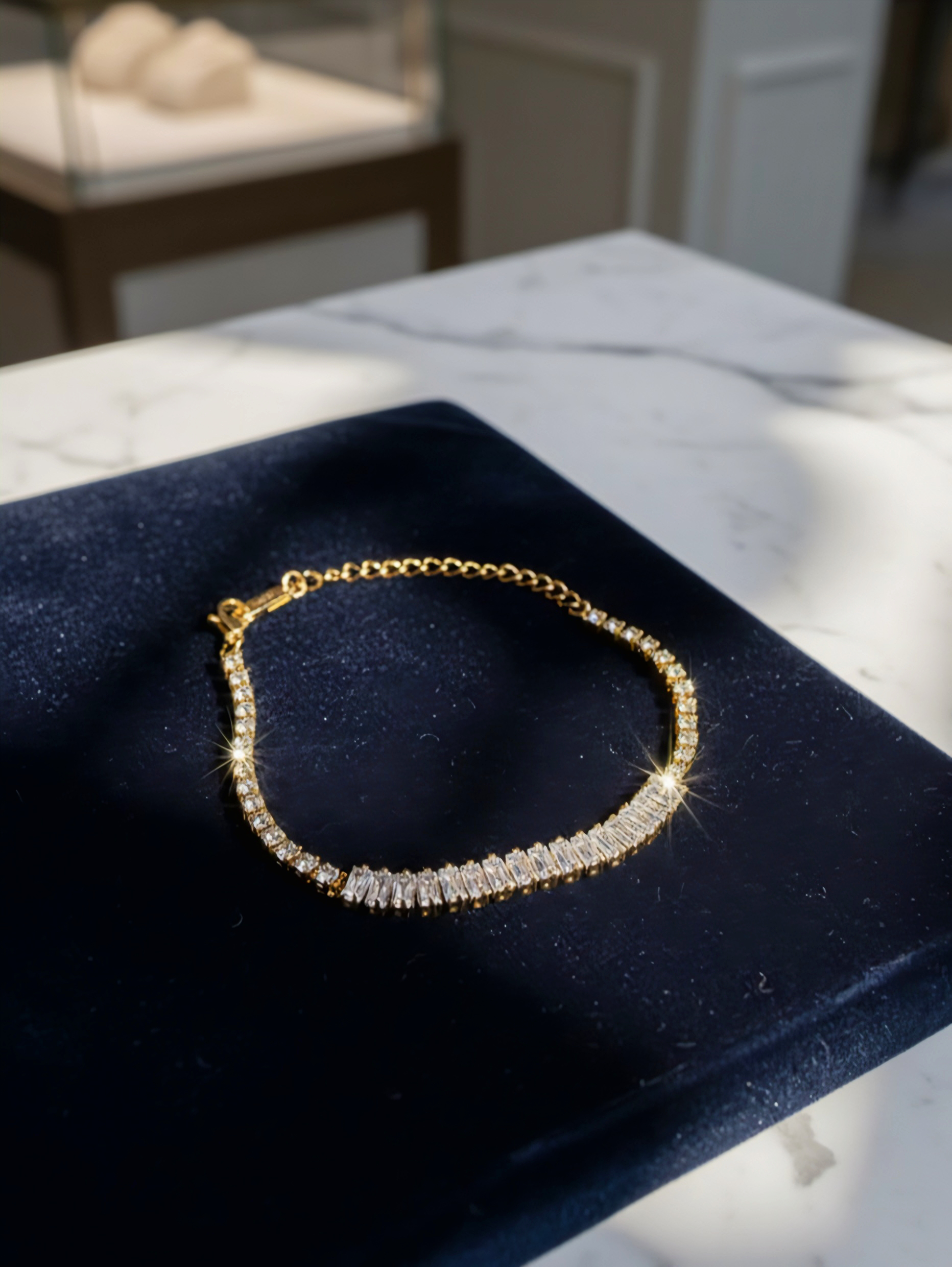 Gold plated American diamond tennis bracelet with sparkling stones and elegant design by Prifine.