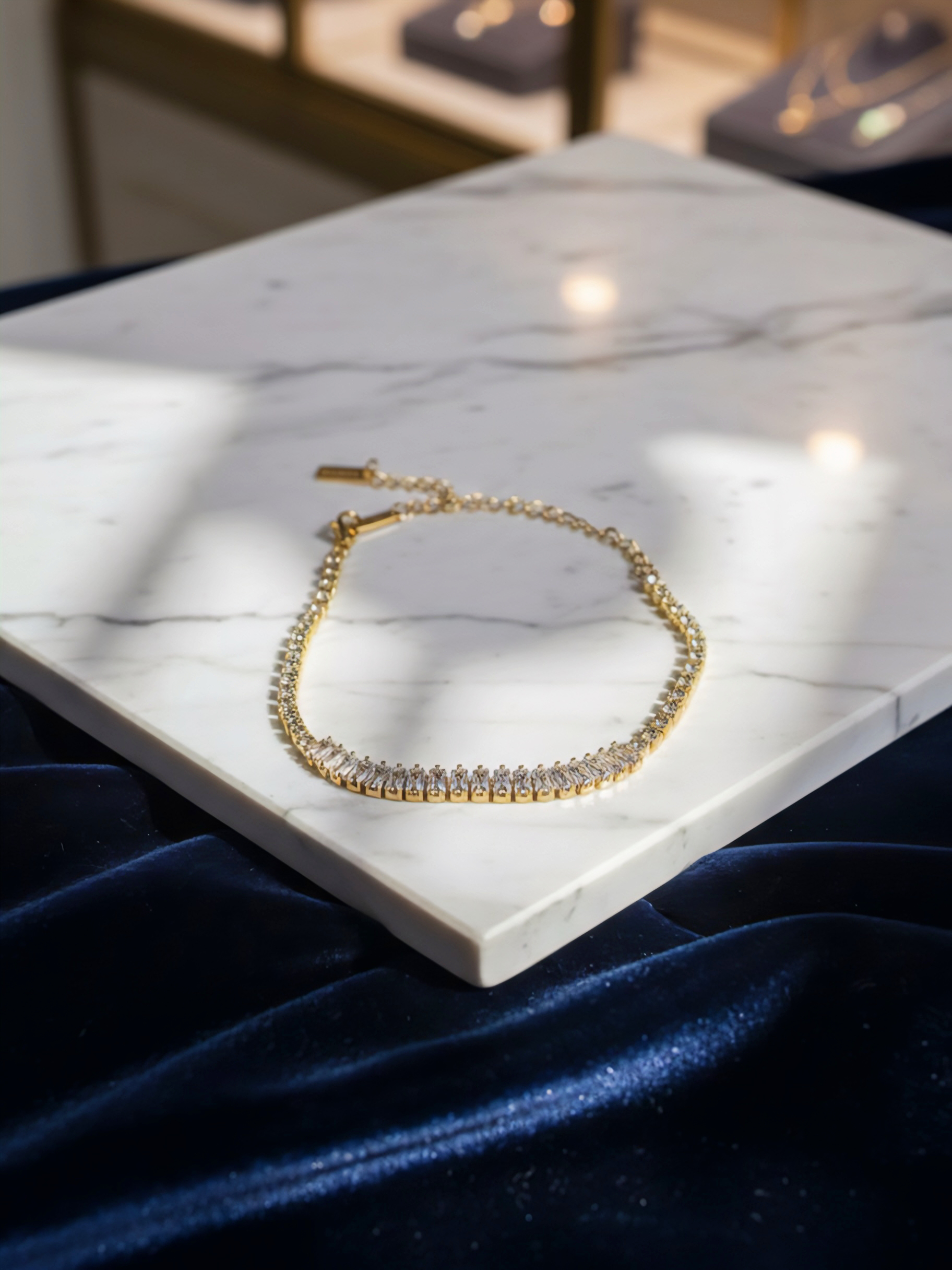 Gold plated American diamond tennis bracelet by Prifine featuring sparkling stones and a sleek, elegant design.
