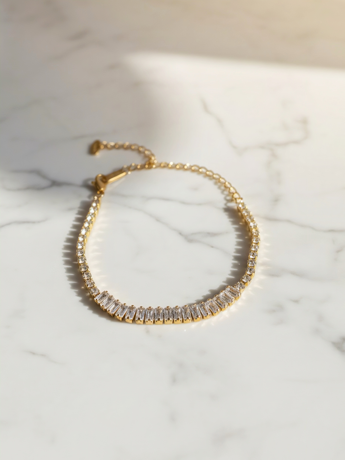 Gold plated American diamond tennis bracelet by Prifine, featuring sparkling diamonds and a sleek design.