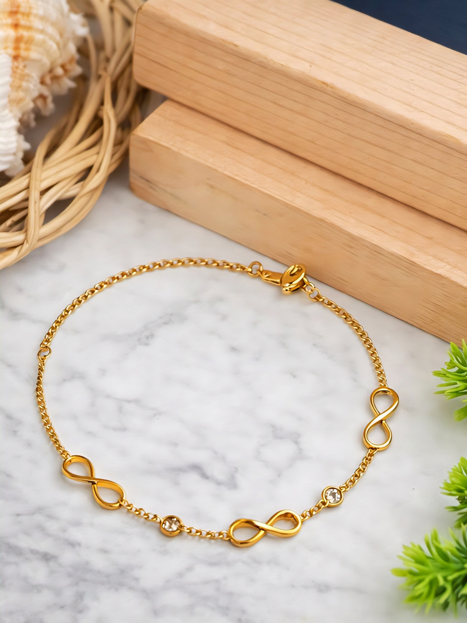 Prifine Infinity Multiwear Gold Bracelet featuring a sleek, adjustable design with a polished gold finish.