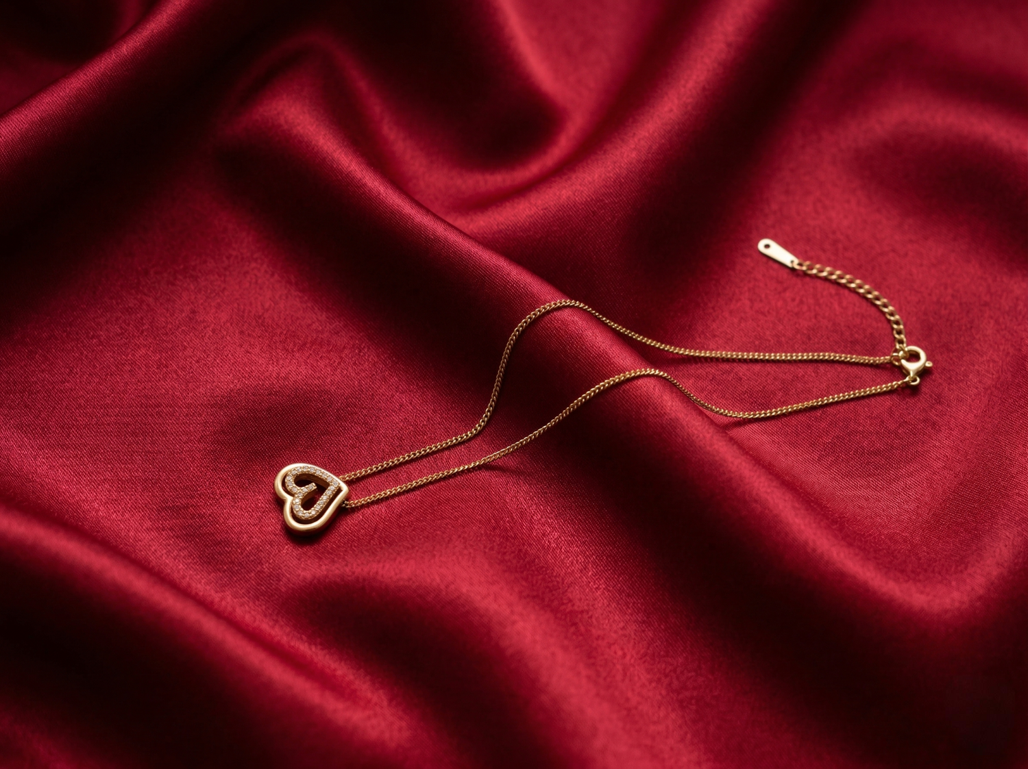 Golden Heart Duo Pendant Necklace by Prifine featuring two intertwined heart-shaped pendants on a delicate chain.