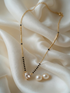 Prifine Shine Heart Mangalsutra featuring a delicate gold chain with a heart-shaped pendant, traditional Indian jewelry for auspicious occasions.
