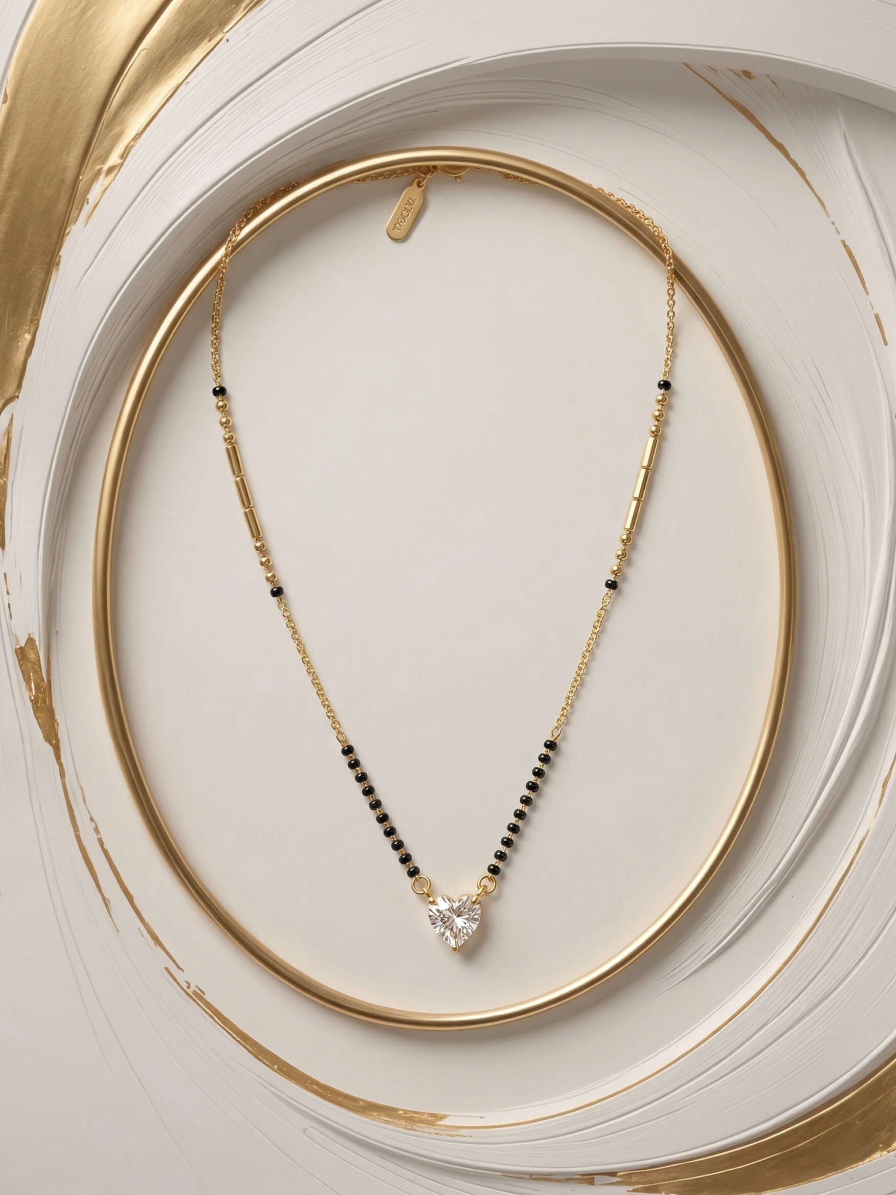 Prifine Shine Heart Mangalsutra with gold chain and pendant featuring a heart-shaped design for traditional Indian jewelry.