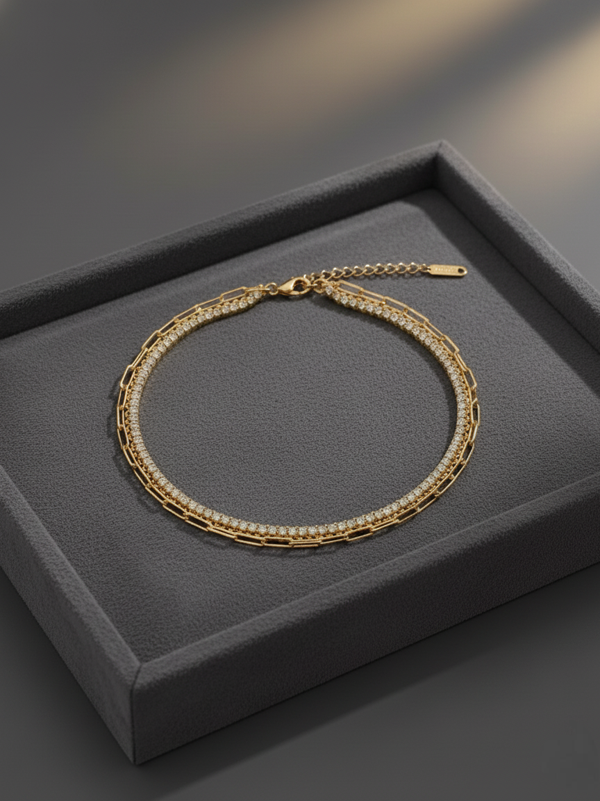 Three layered gold bracelet by Prifine featuring delicate chain links and a polished finish on a white background.
