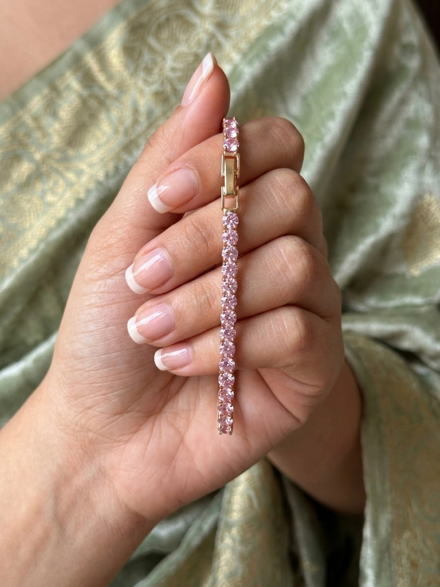 Prifine blush pink diamond spark tennis bracelet featuring sparkling diamonds and a delicate design on a white background.