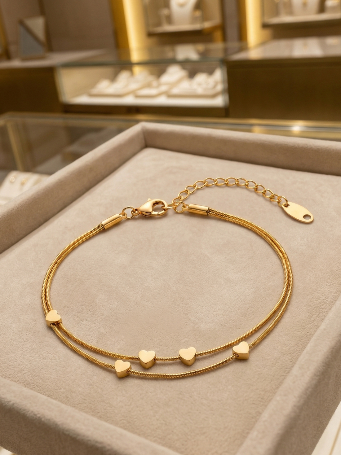 Prifine heart chain bracelet featuring delicate interconnected heart-shaped links on a silver-tone bracelet.