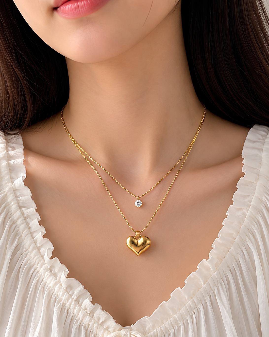 Gold tone layered heart pendant necklace by Prifine, featuring multiple heart charms and delicate chain details.